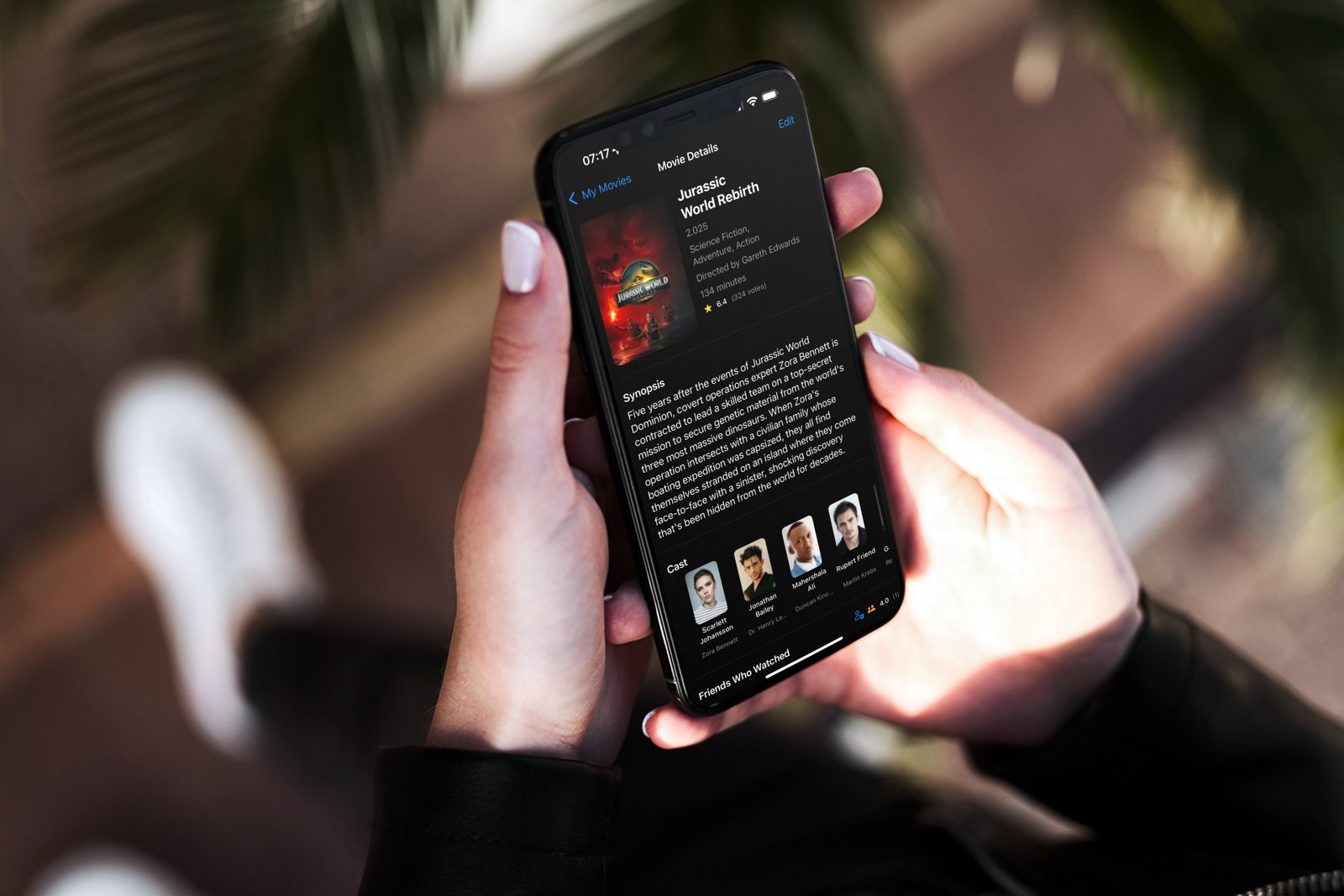 Movie List app on iPhone showing the movie detail page for Jurassic World Rebirth, with synopsis and cast